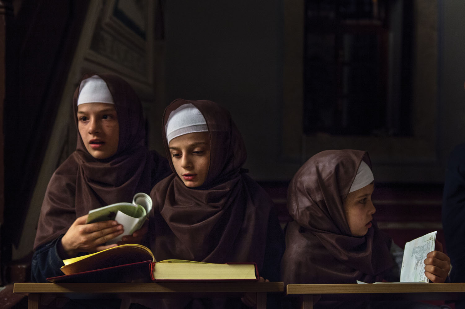 Albanian children studying the Koran. Kosovo. 2013.