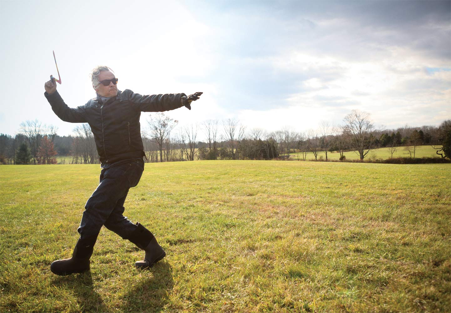 Orozco throwing boomerangs at his Pennsylvania farm, 2013. (Oskar Landi)