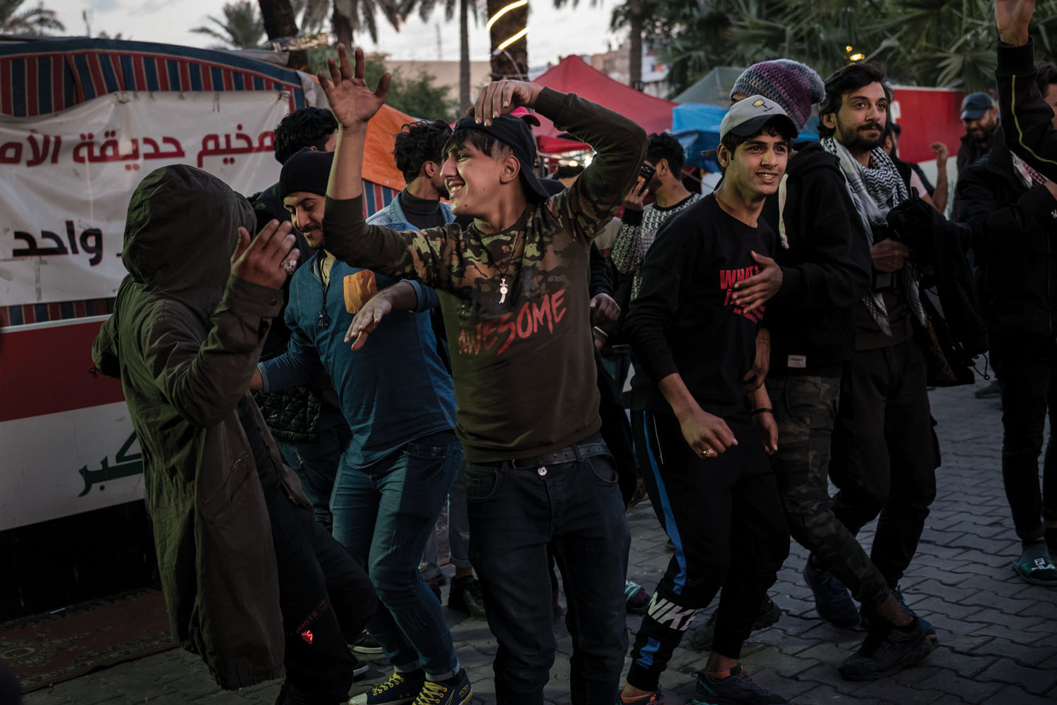 Protesters dance in front of their encampment in Tahrir Square. Tahrir translates to “liberation” or “freedom.”