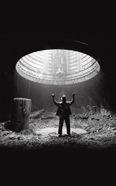 Shaft miner at the 2,500-foot-level station before mucking and drilling, Louvicourt Mine, Val-d’Or, Quebec.