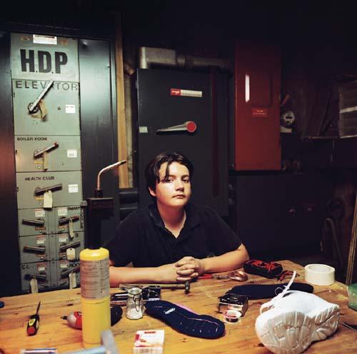 Gabriel Mesa in the basement of his grandfather's building, designing a shoe for diabetics that improves circulation.(Christina Paige) 