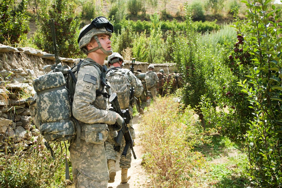 A soldier from the 10th Mountain Division on a joint patrol with the Afghan National Army (ANA) in the Jalrez Valley, Wardak Province.